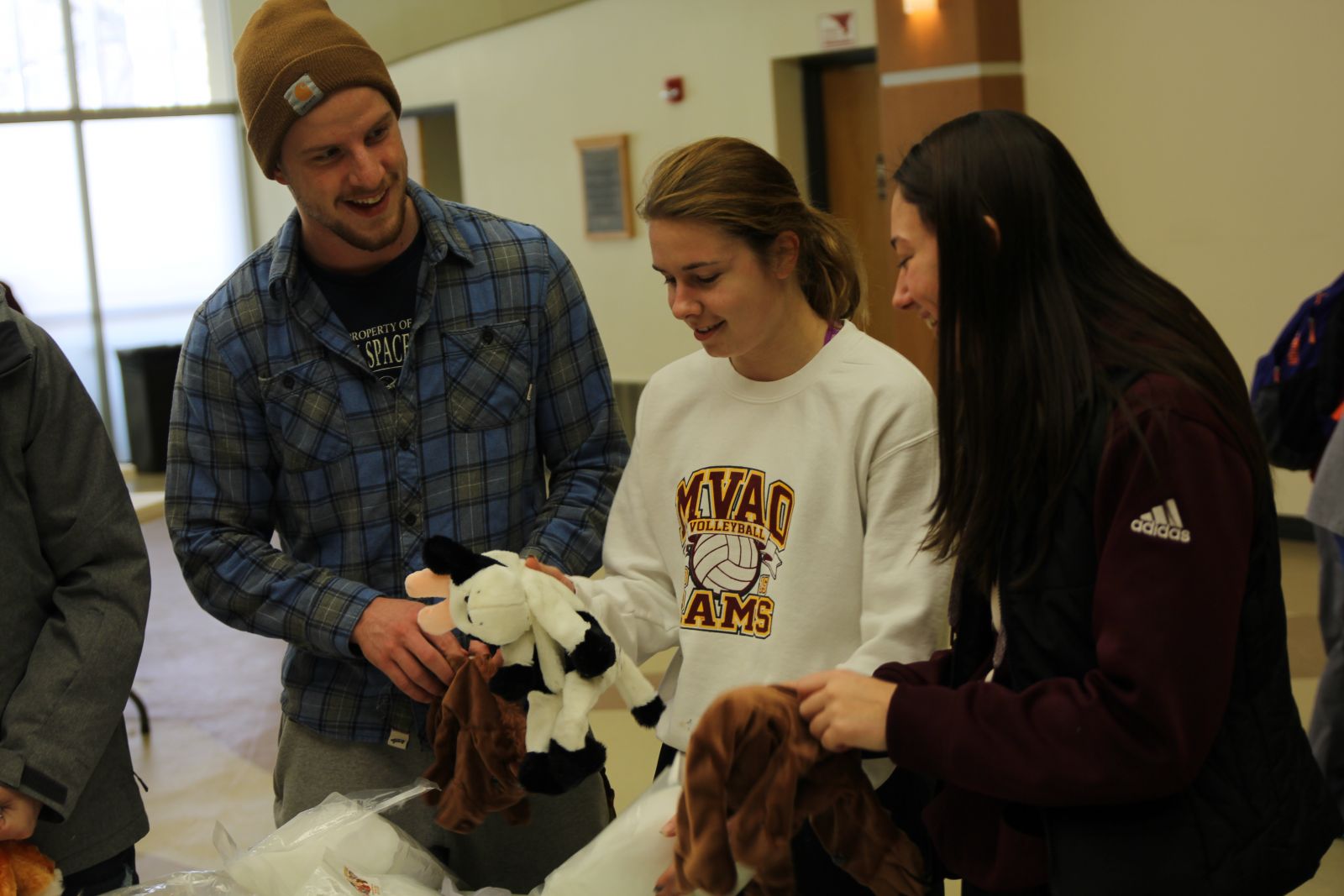 students stuffed with a stuffed cow